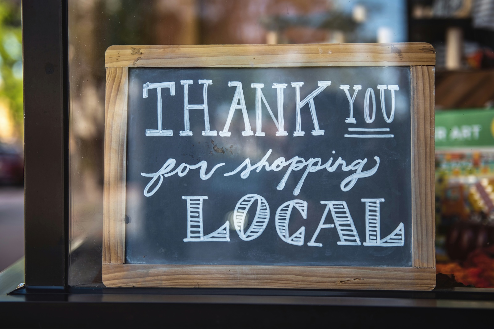 stock image of a sign that says support local