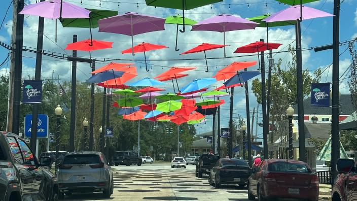 Umbrellas overhead on Antique Alley in Slidell, LA