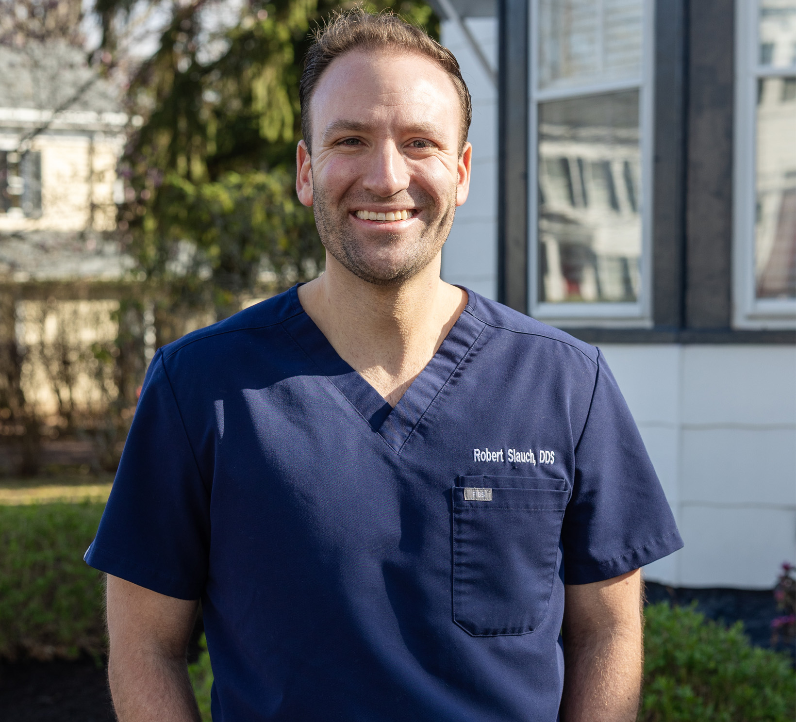 Dr. Rob Slauch standing outside Pennington Dental Association's office