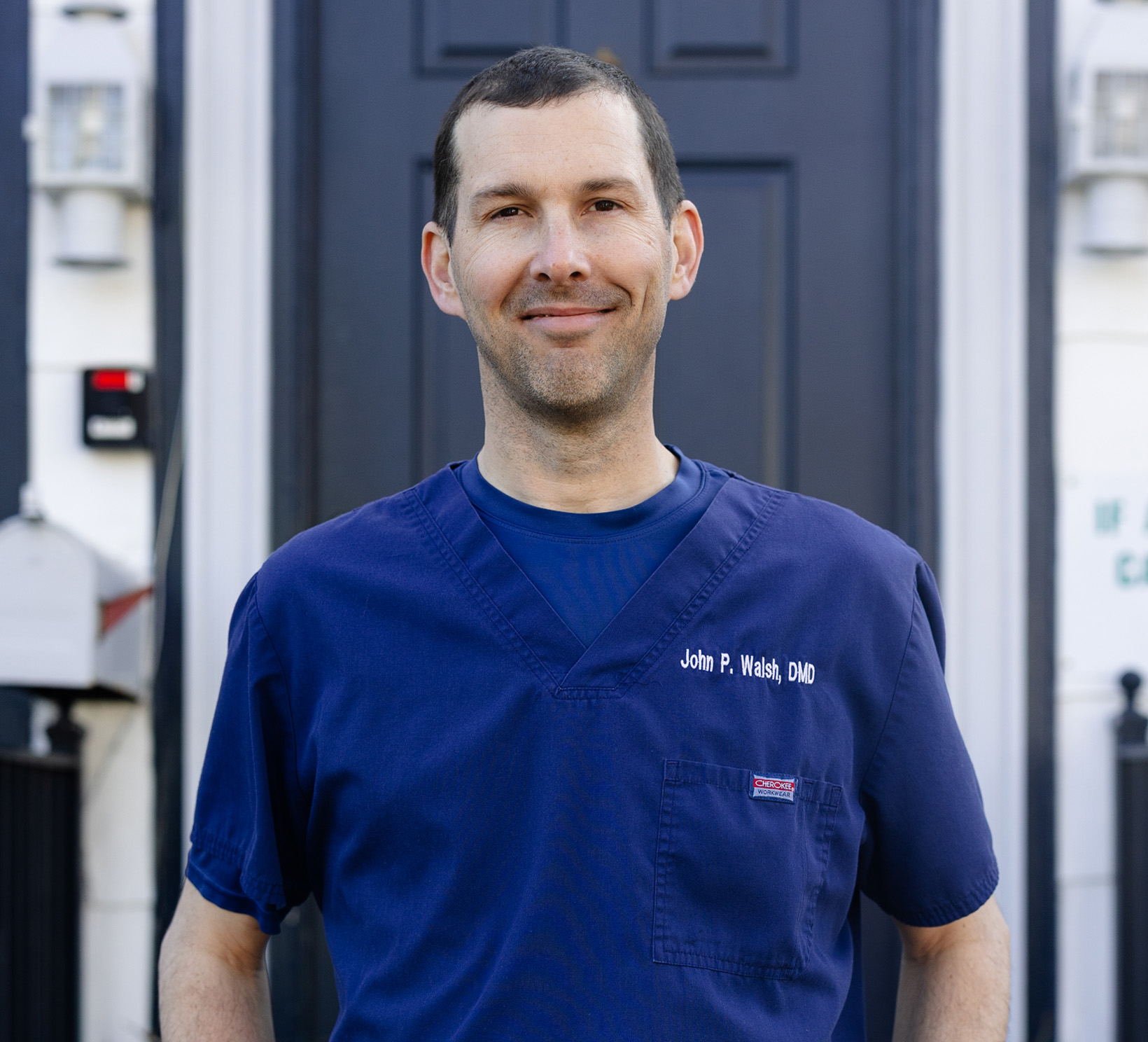 Dr. John Walsh standing outside Pennington Dental Association's office