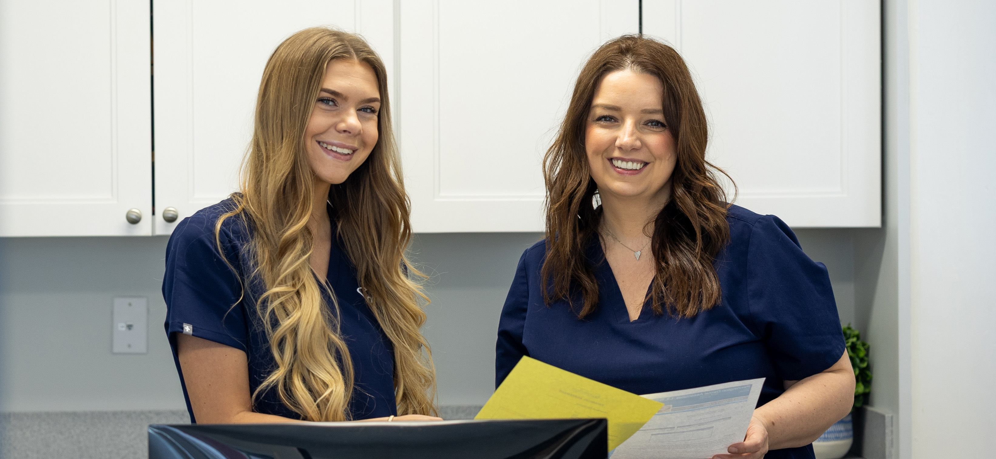 Team Members at Front Desk