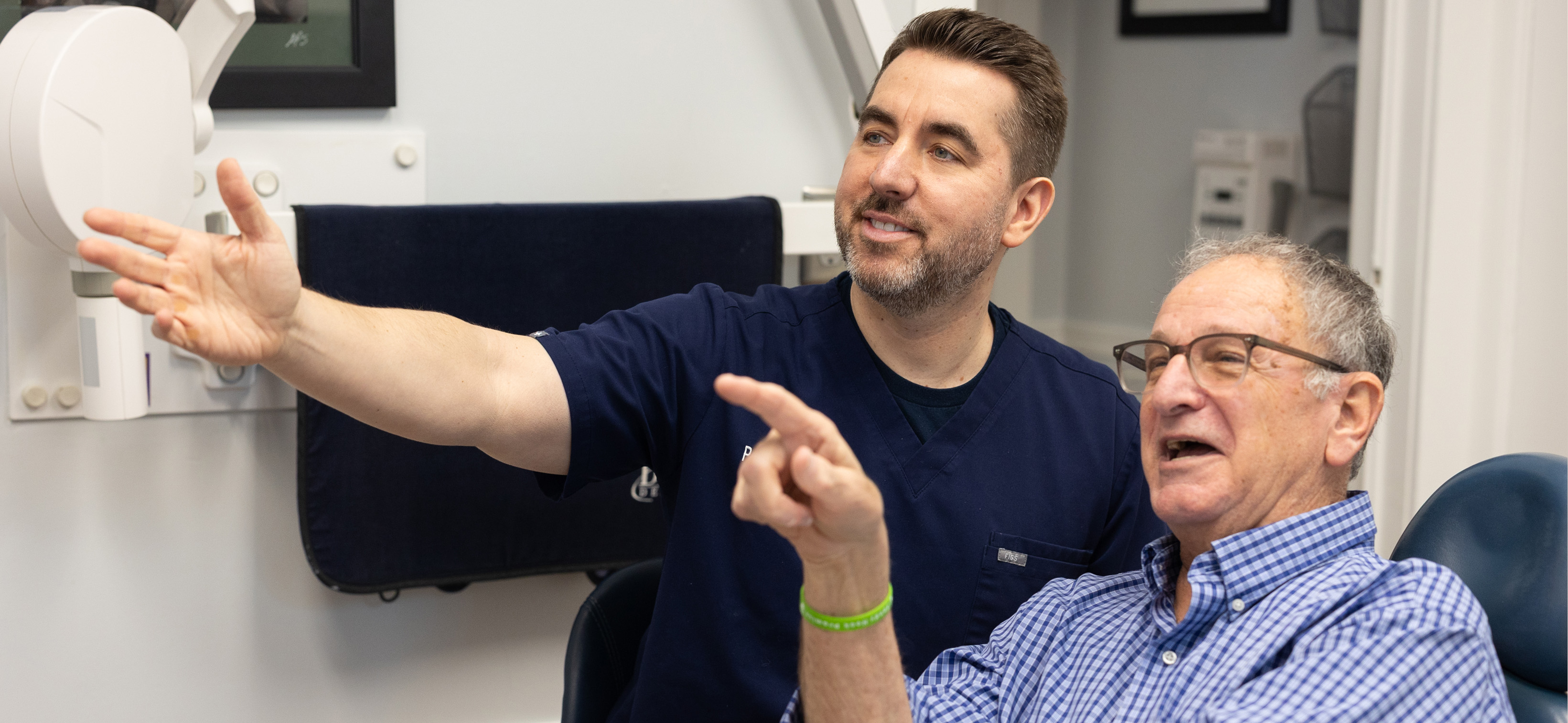 Dr. Paul with a patient