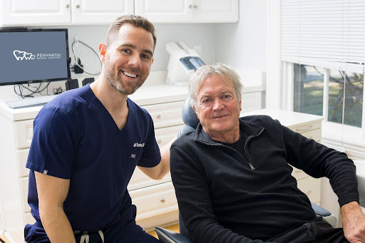 Dentist and patient at Pennington Dental Associates after dental crown treatment, showcasing the versatility of modern restorative dentistry.