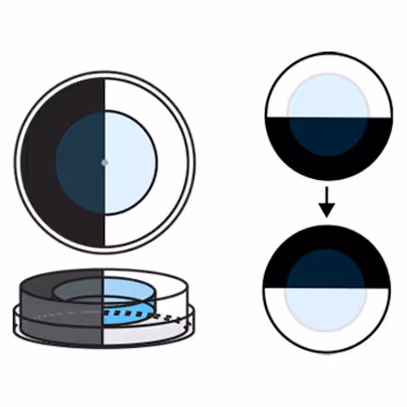 Concentric petri dish apparatus where larvae are placed in the center chamber while the outer chamber rotates to switch light and dark sides, allowing researchers to test larval light preference