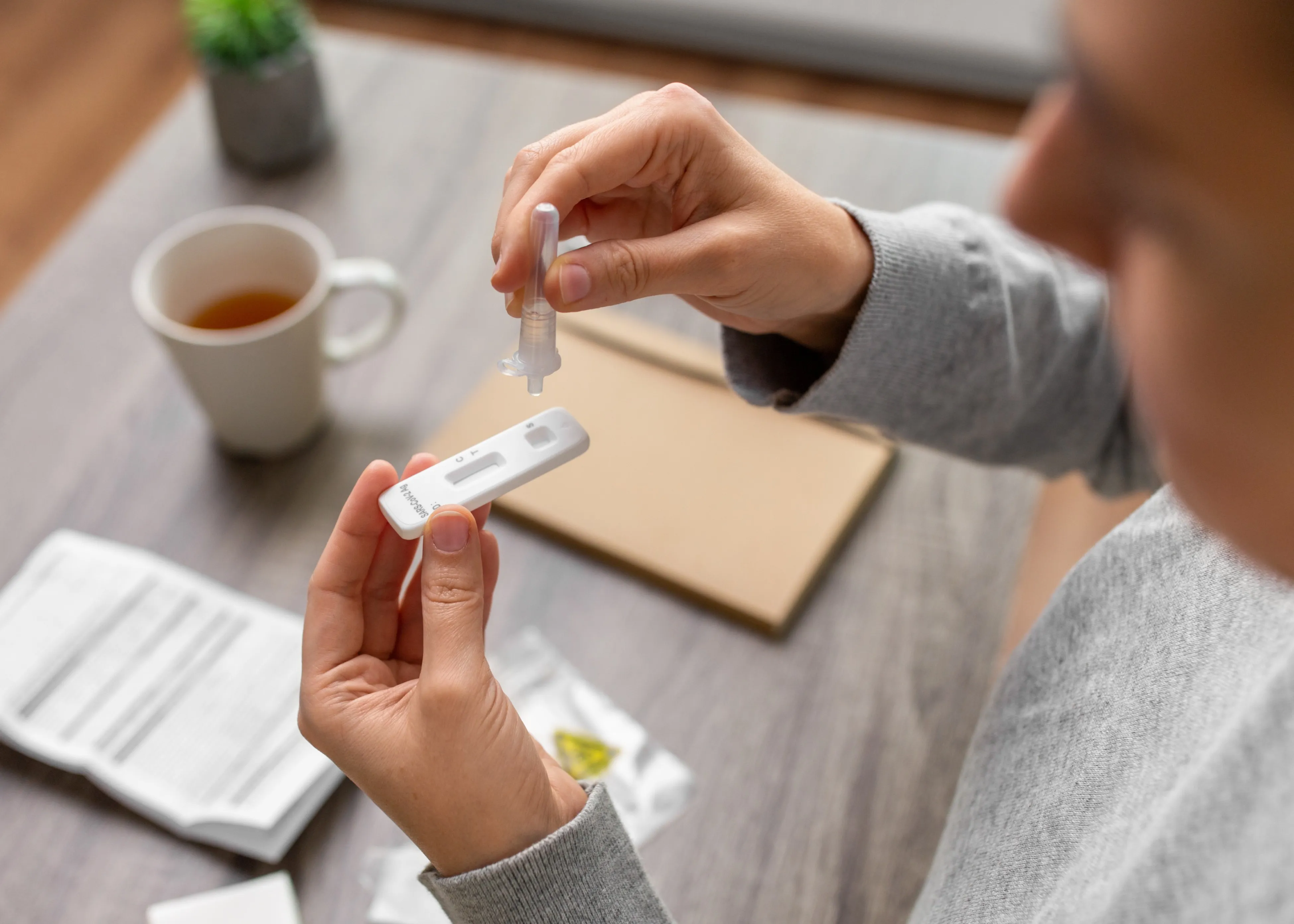 A woman taking a Covid test.