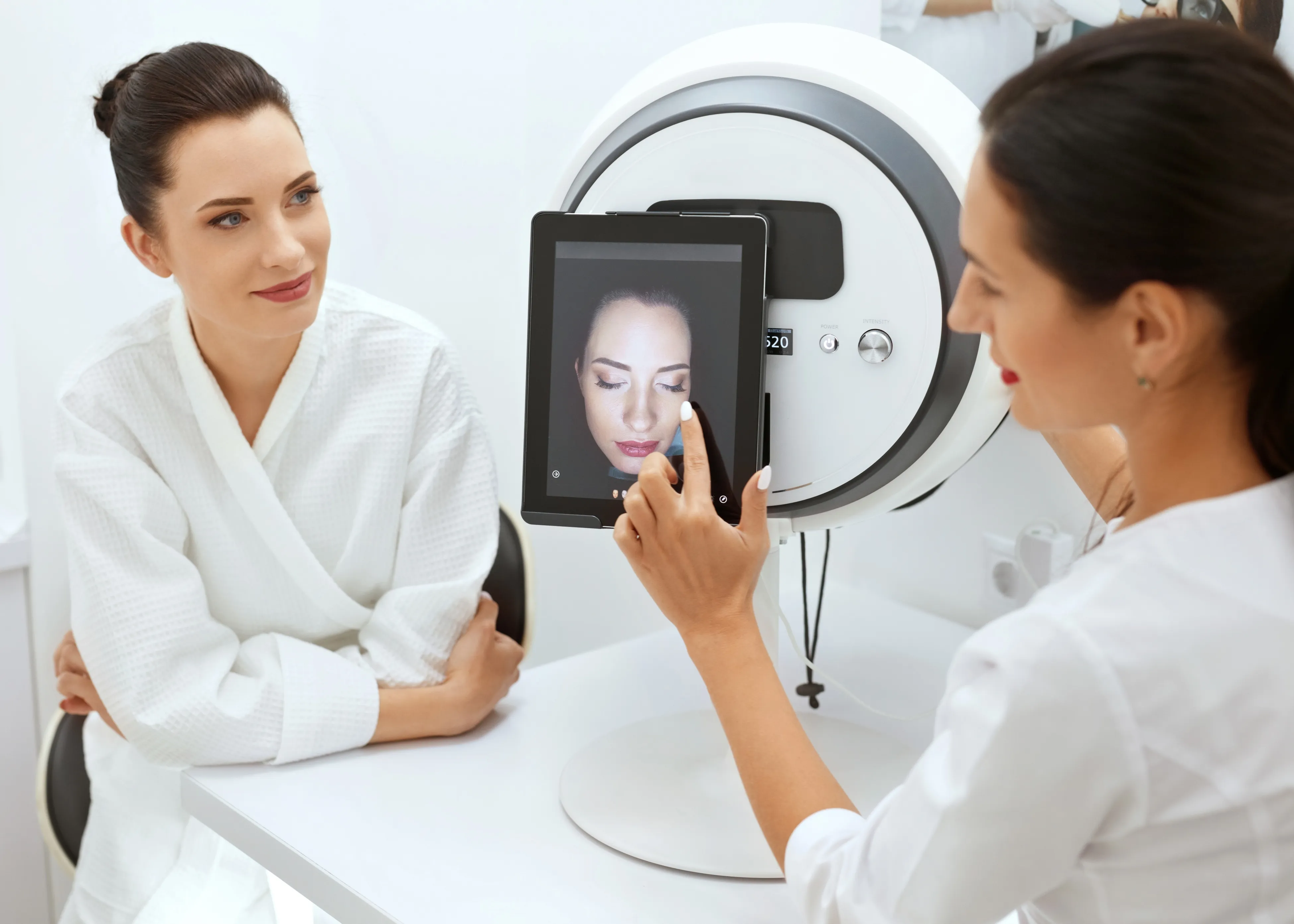 A woman using Alma IQ