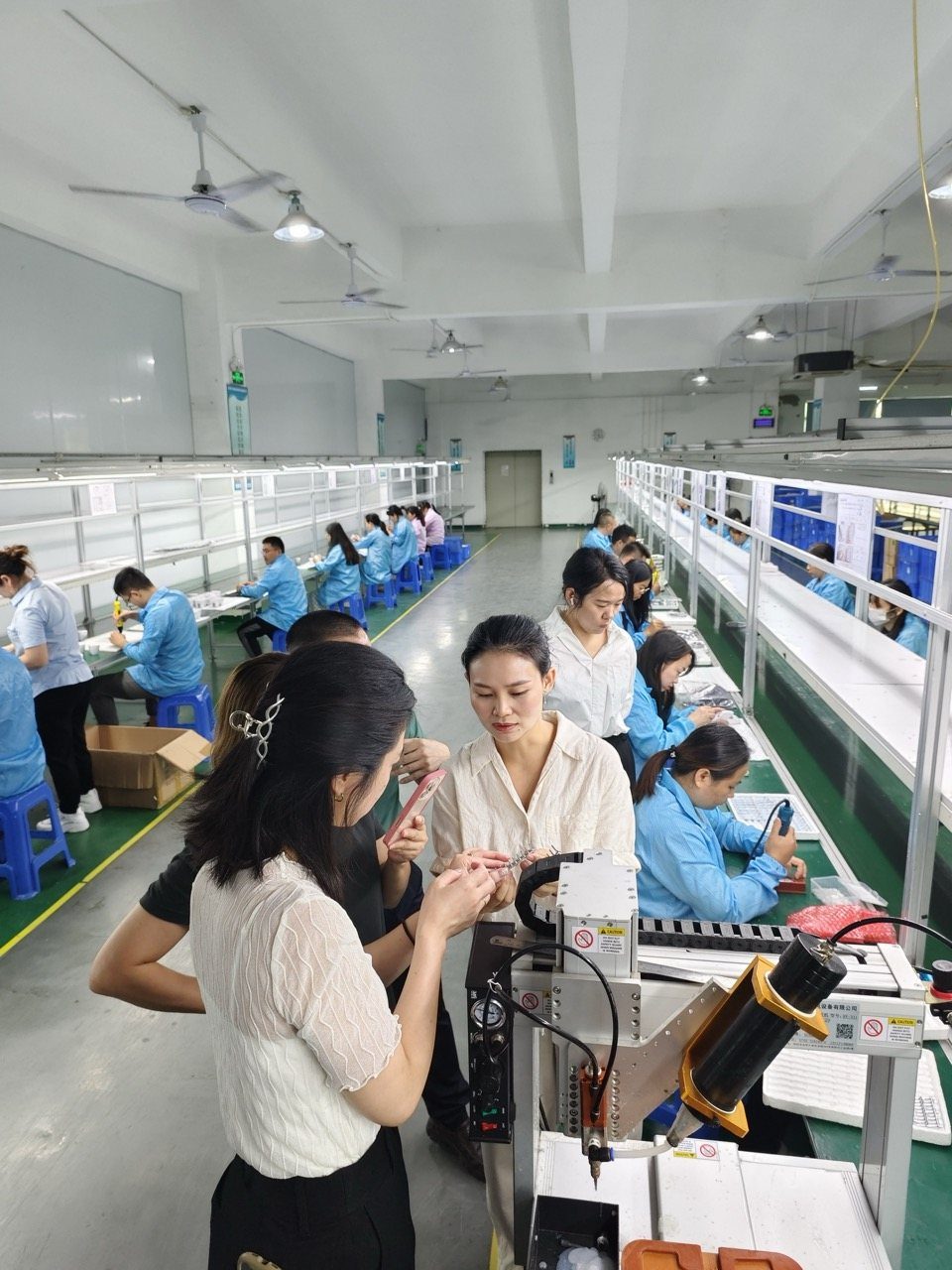 Reviewing product requirements with the client on the production floor
