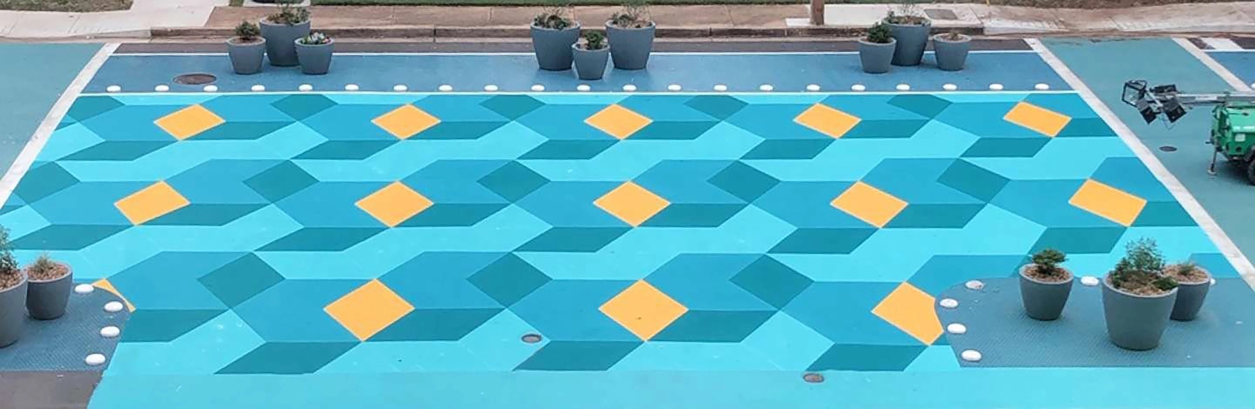 colorful geometric pattern on asphalt