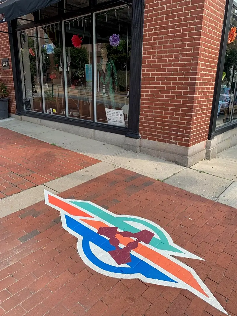 custom logo design on sidewalk