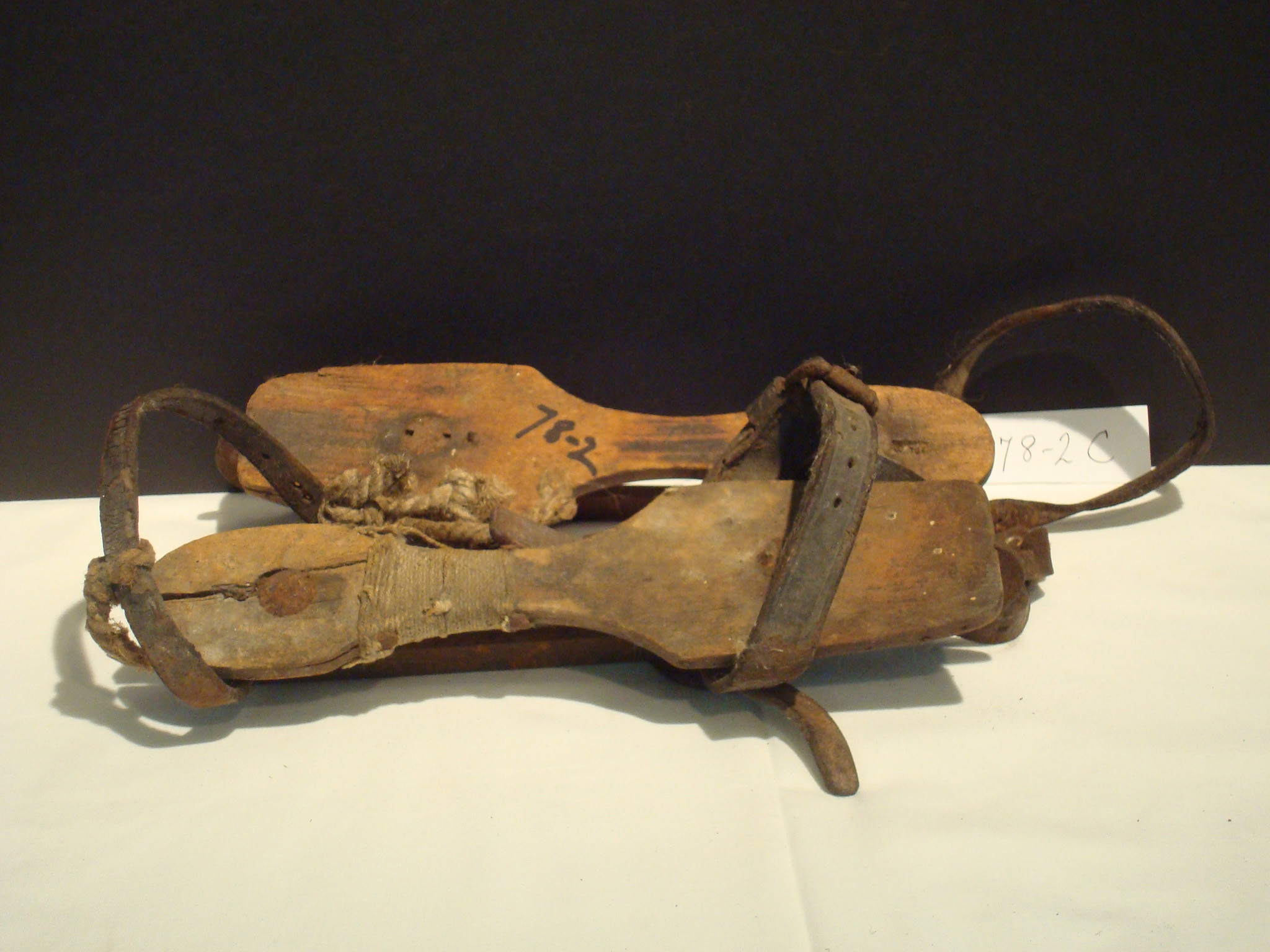 Early wooden ice skates from Monterey, Massachusetts, showcasing handcrafted winter footwear used in 19th-century rural New England.