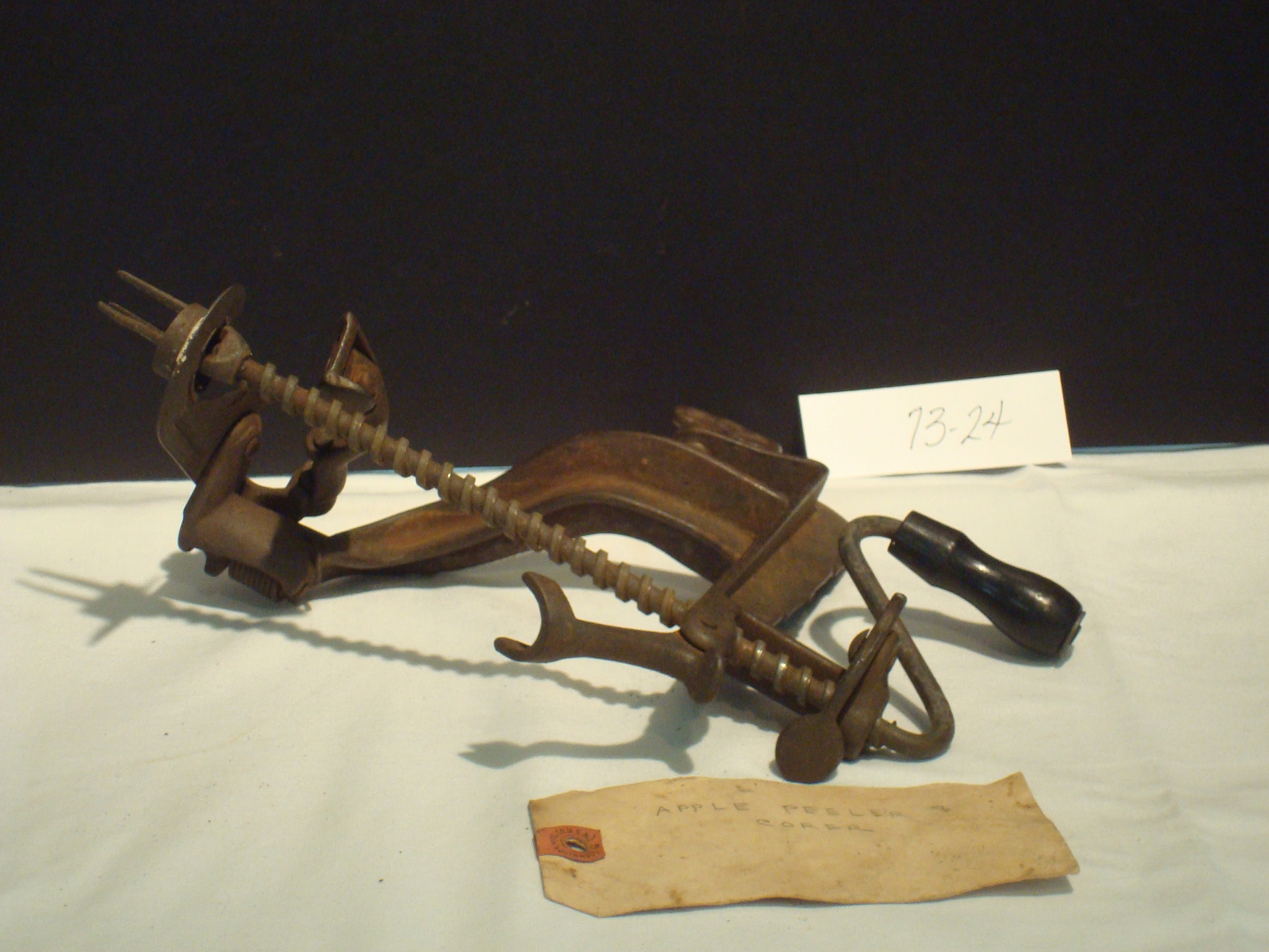 Antique apple peeler and corer from Monterey, Massachusetts, used in early kitchens for food preparation and preservation.