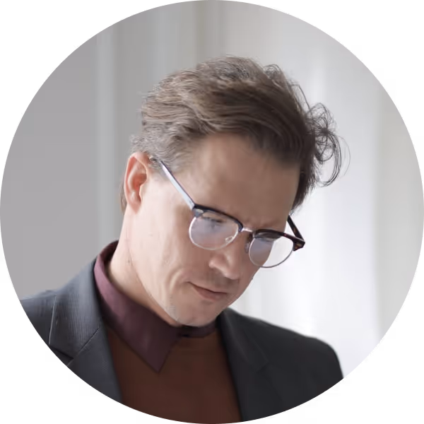 Middle-aged man looking down at something