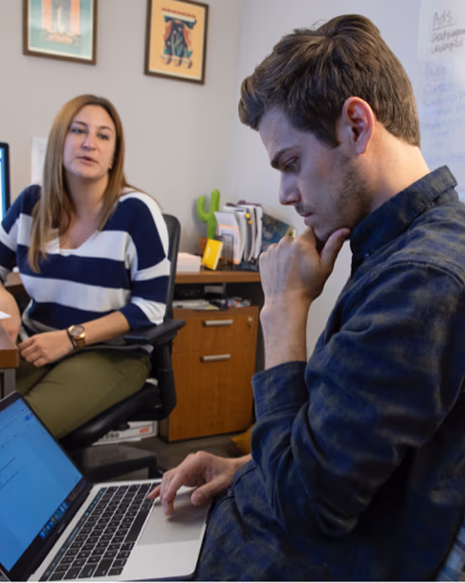 Chris Jordan collaborating with coworker