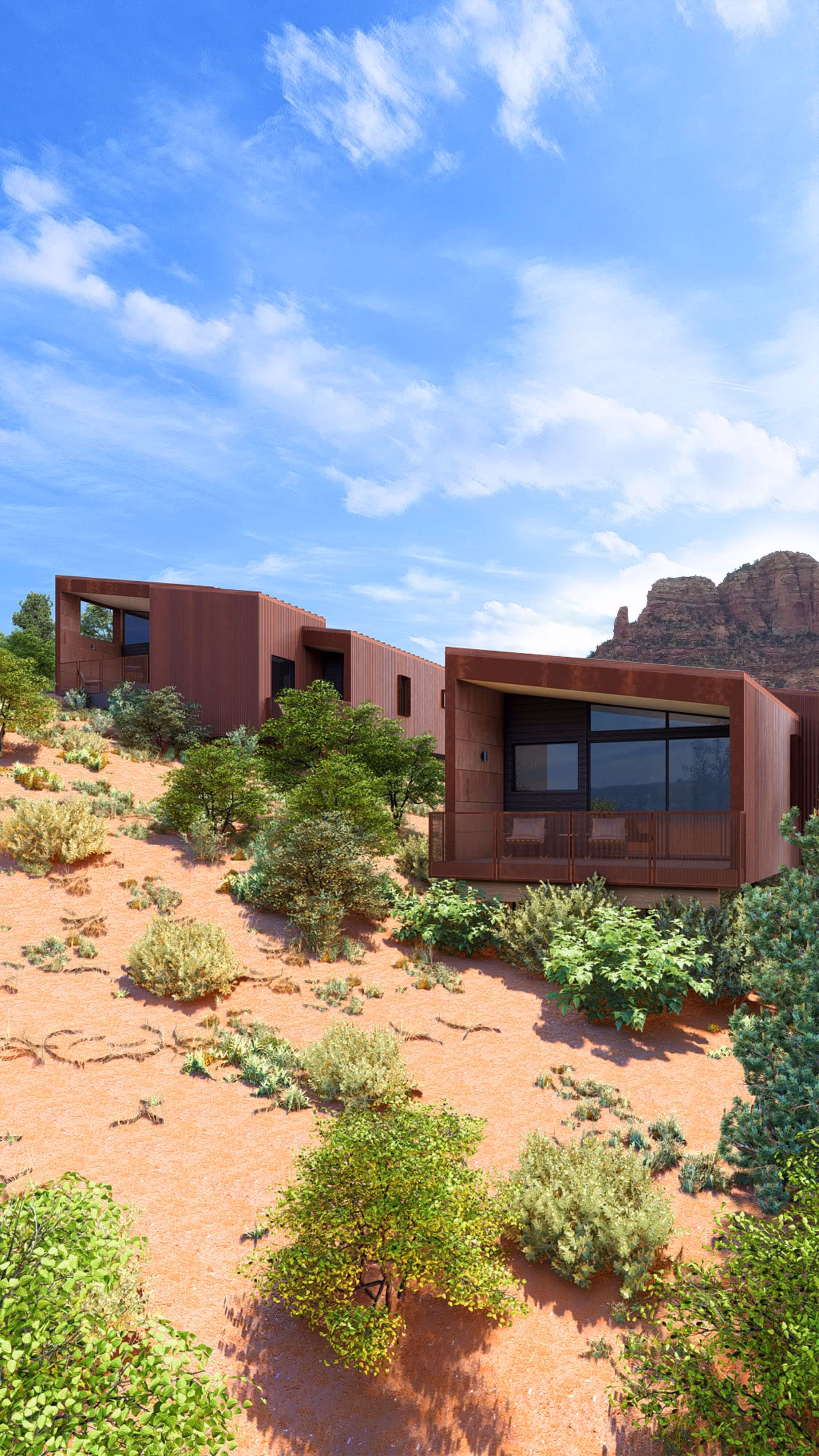Back of Fox & Kit - a short term rental property with two homes designed by The Ranch Mine - against the red rocks of Sedona, AZ