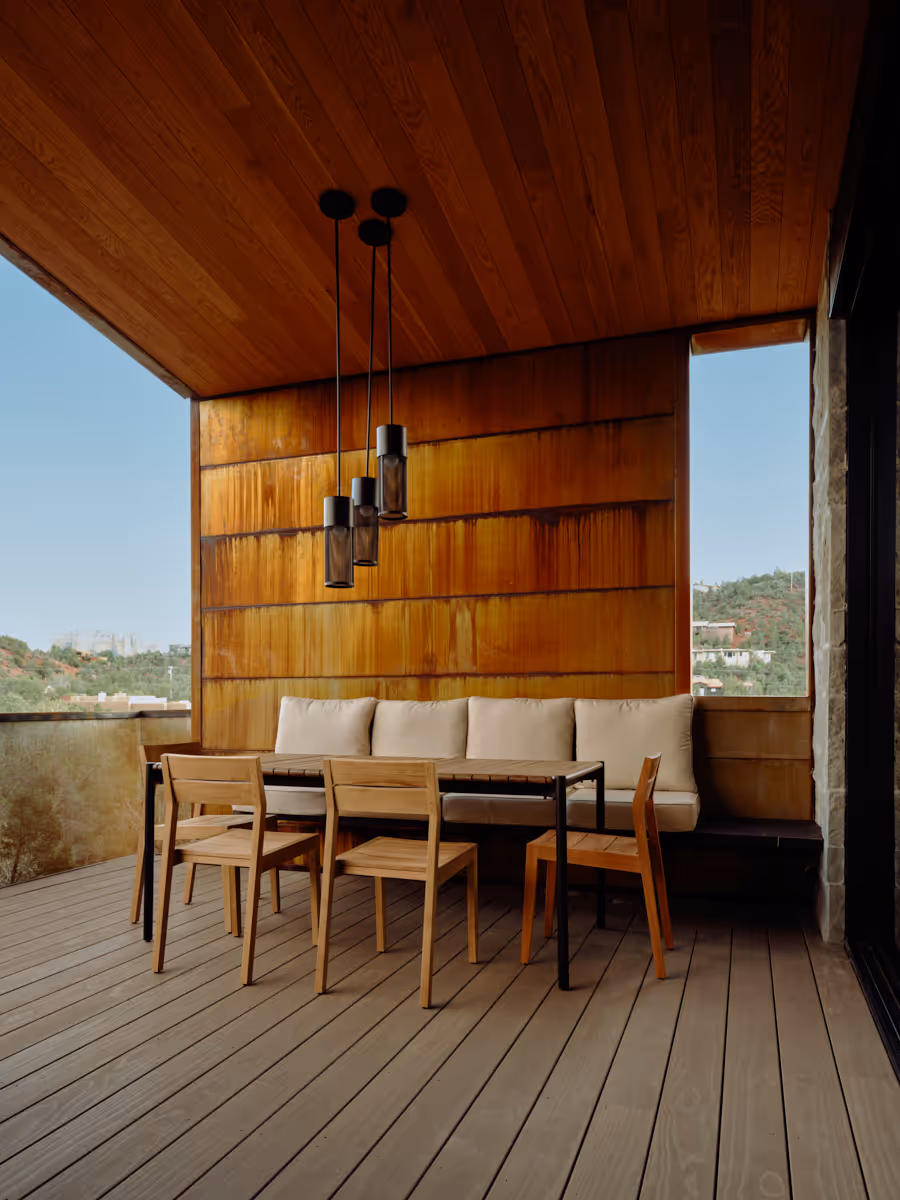 Covered patio with dining at Kit a modern home rental in Sedona