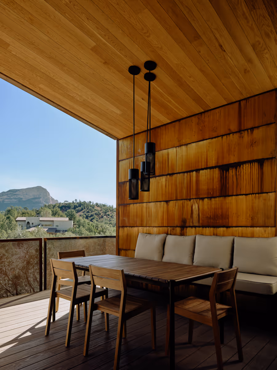 Covered patio with dining at Kit a modern home rental in Sedona
