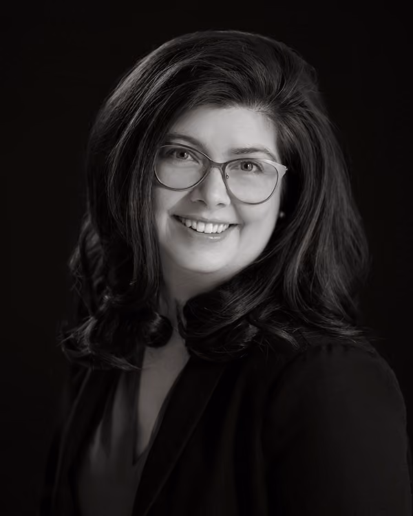 Black and white portrait of Dominique Lavoie, Office Coordinator, BDA Group.