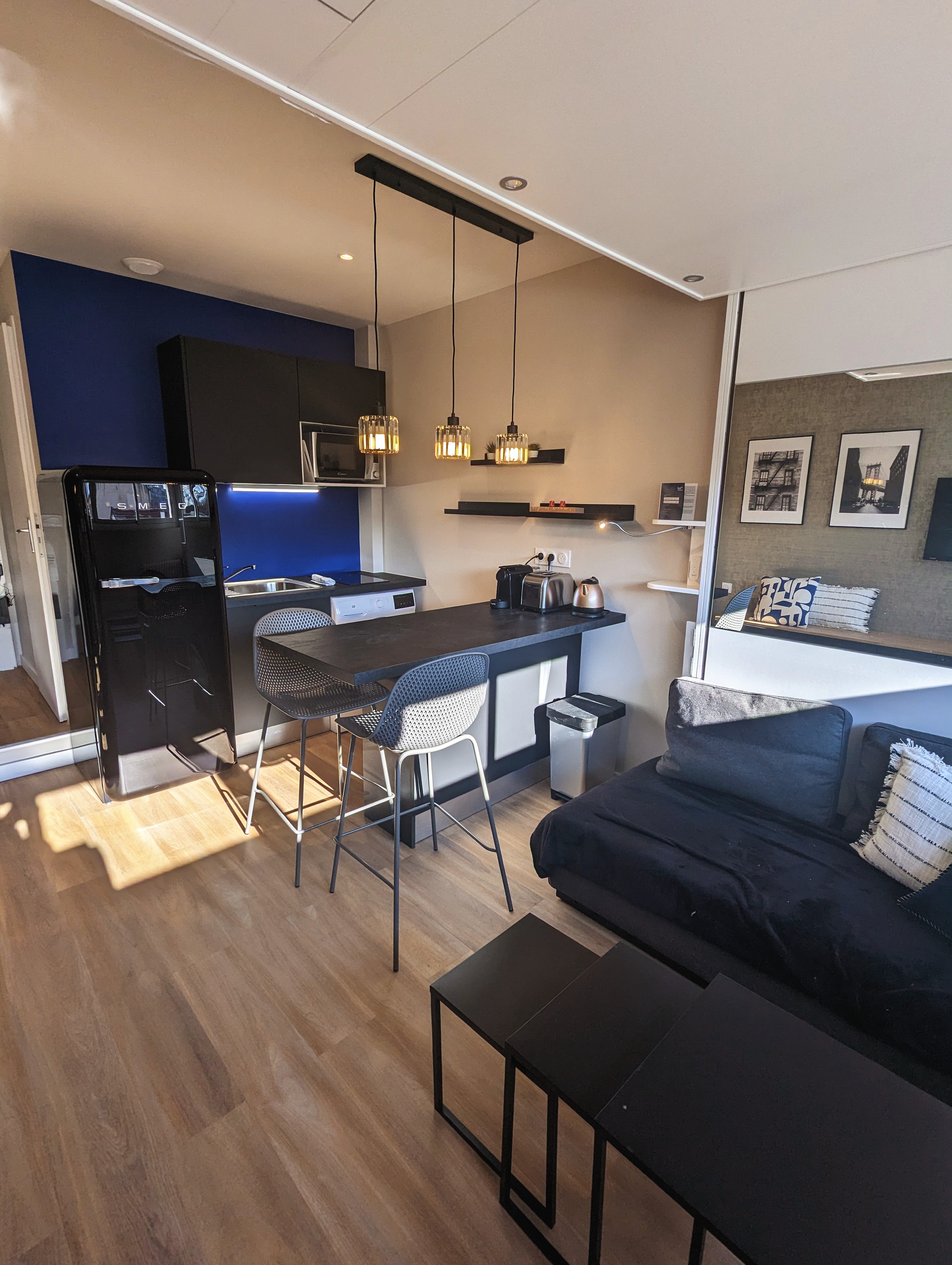 Studio thème industriel avec coin cuisine + séjour + lit escamotable BED UP