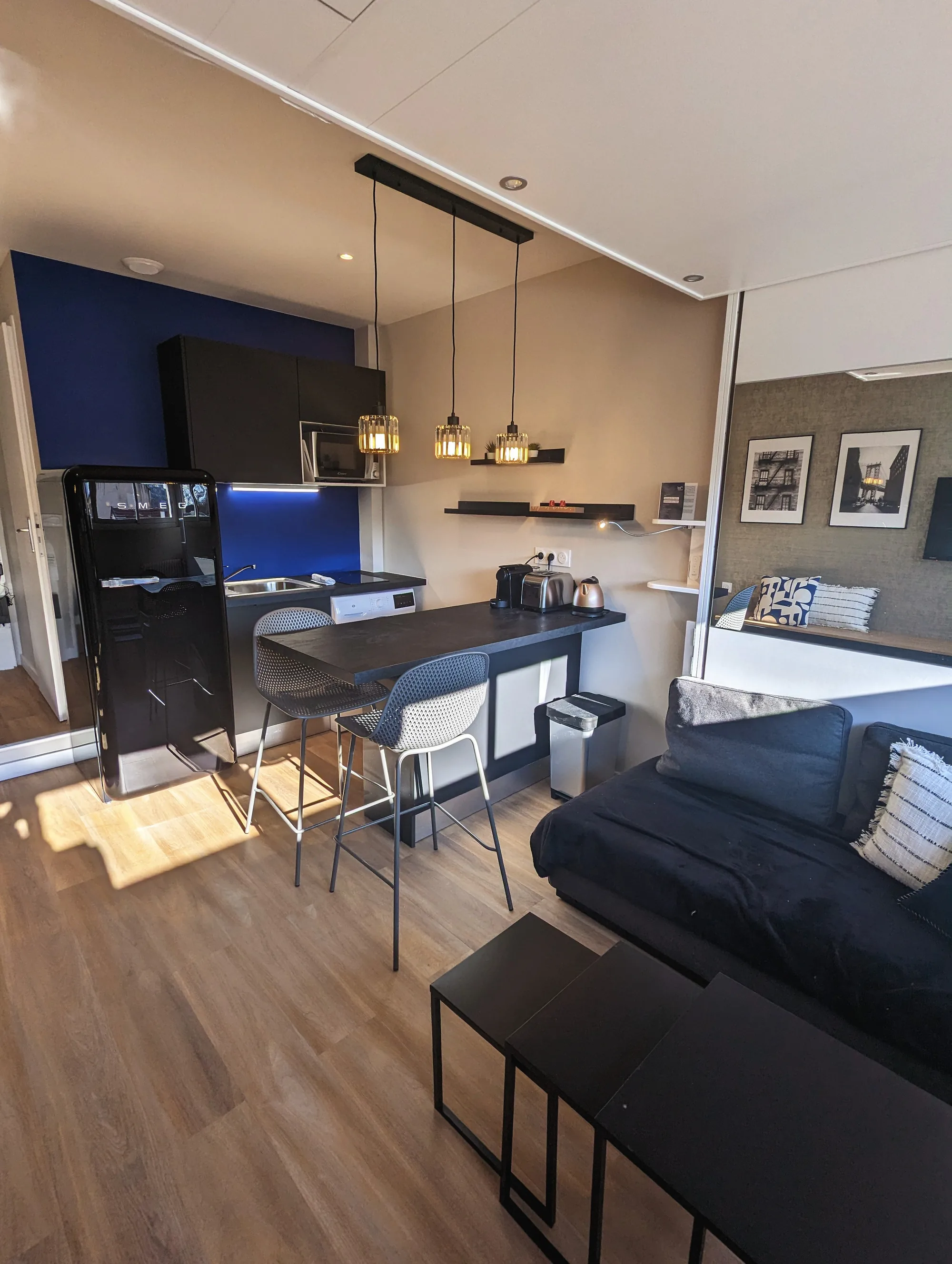 Studio thème industriel avec coin cuisine + séjour + lit escamotable BED UP
