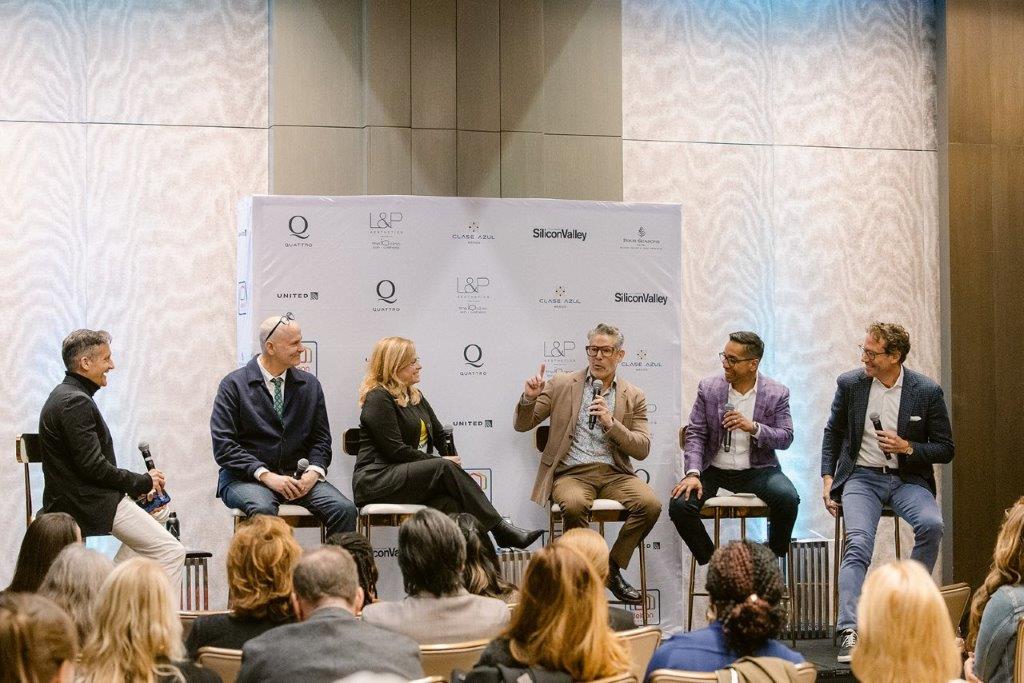 Participants engaged in an Elevate Advisory leadership workshop, collaborating through hands-on activities and strategic team training exercises.