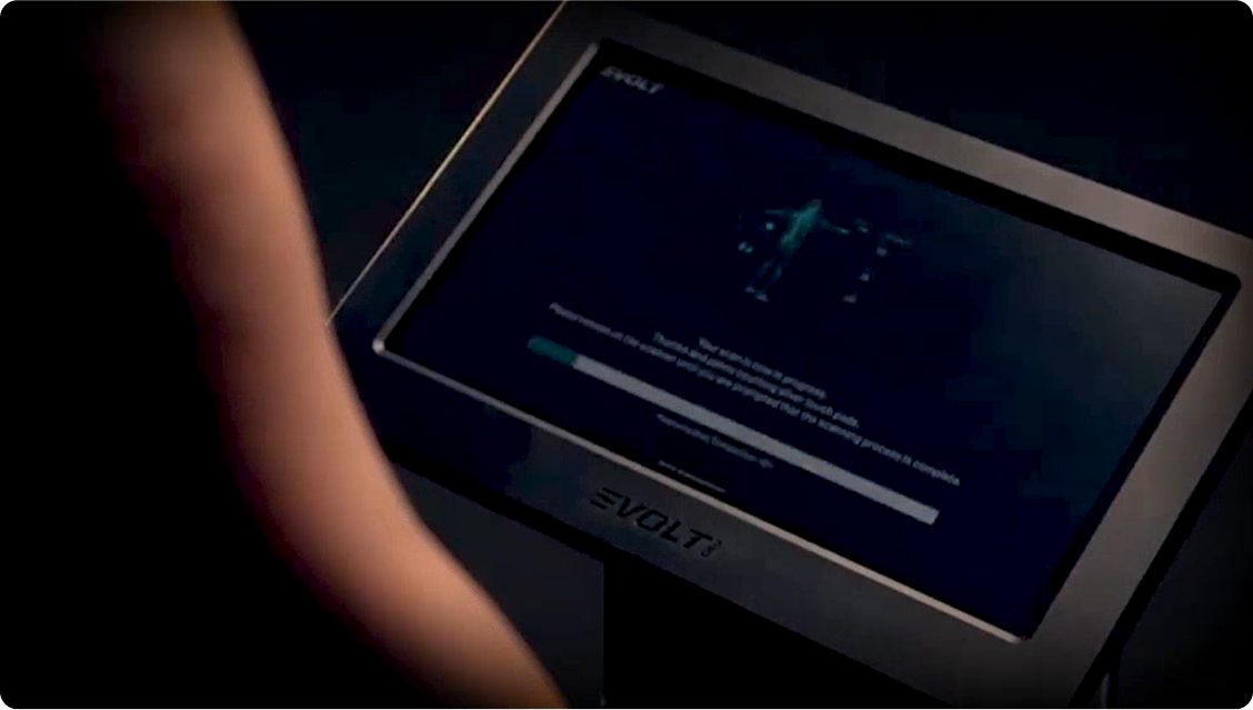 a person standing in front of a screen