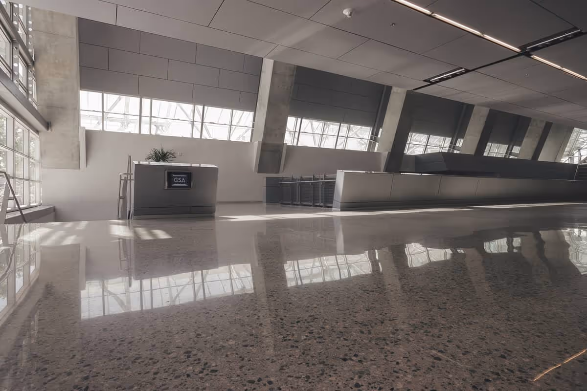 Lobby of an institutional building with polished concrete flooring