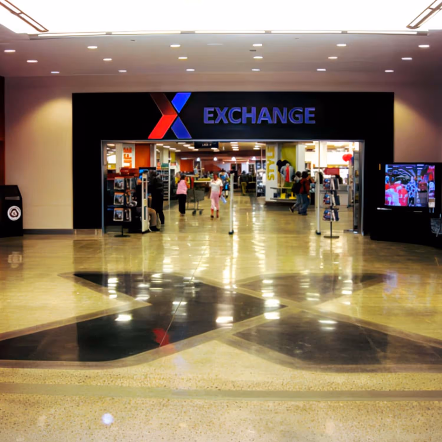 Logo on a polished concrete floor in a mall