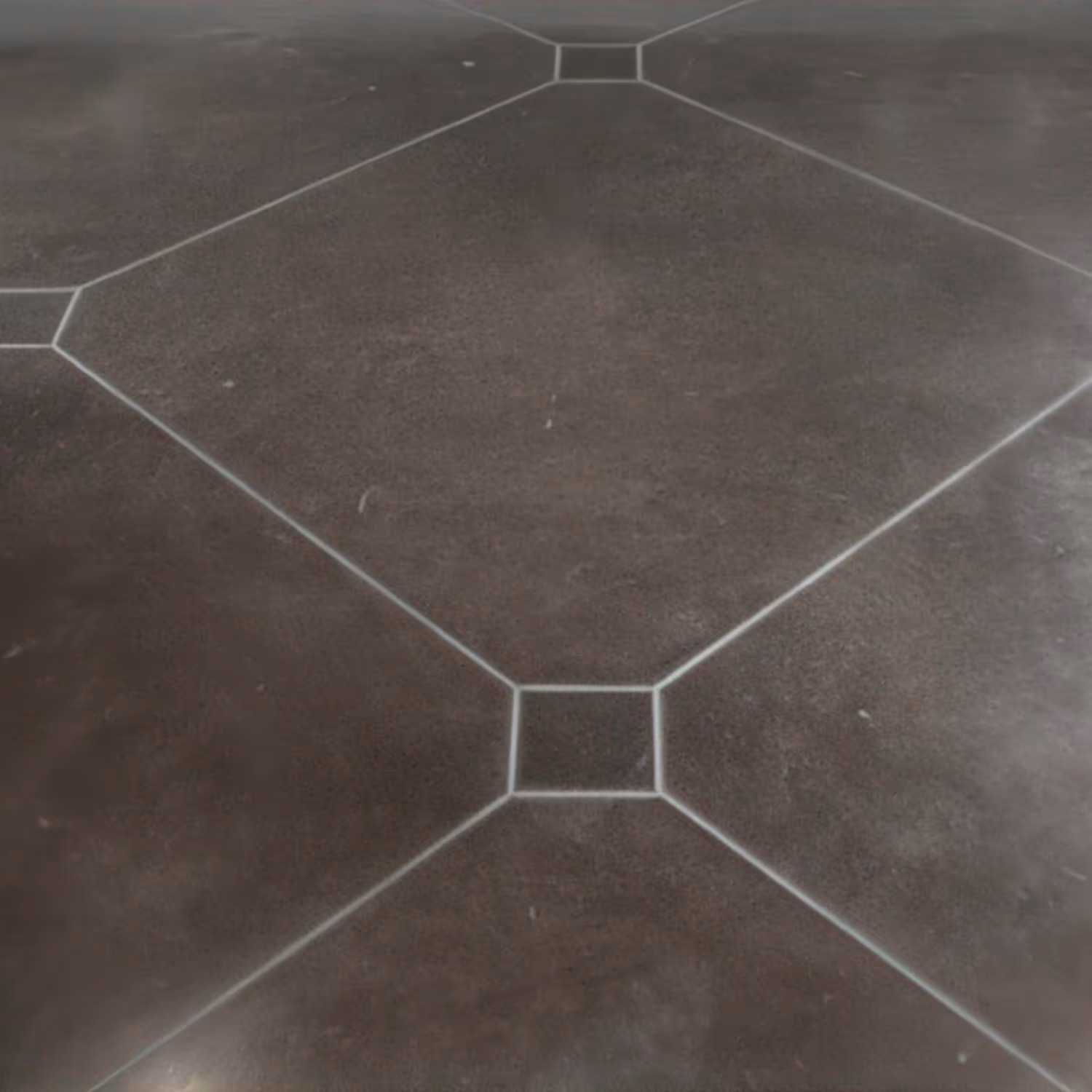 Concrete flooring with decorative cut lines