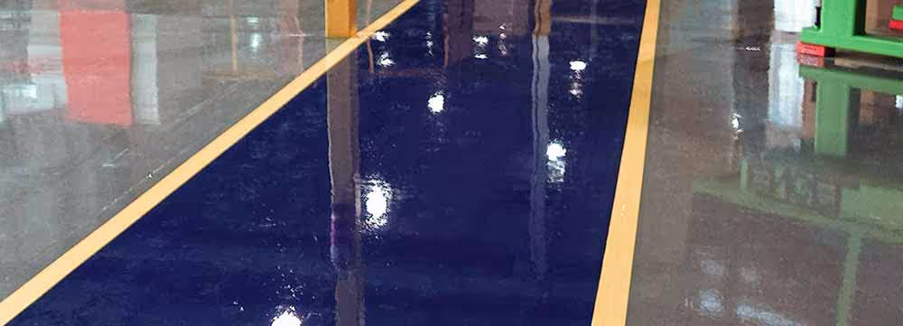 Wide image of resinous flooring in a warehouse