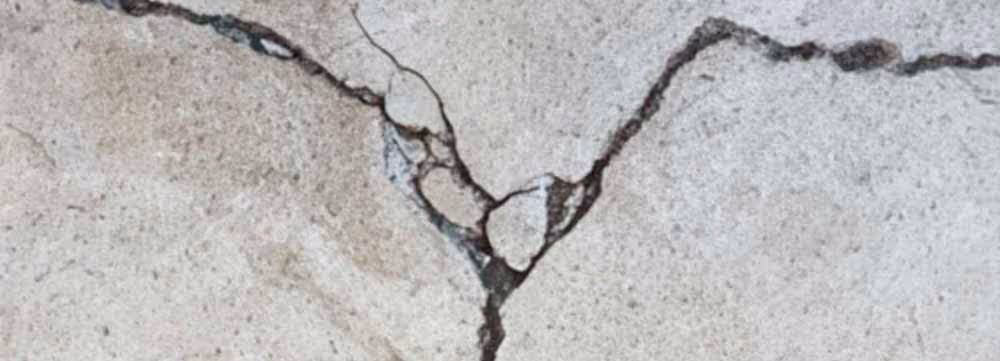 Wide image of cracked concrete