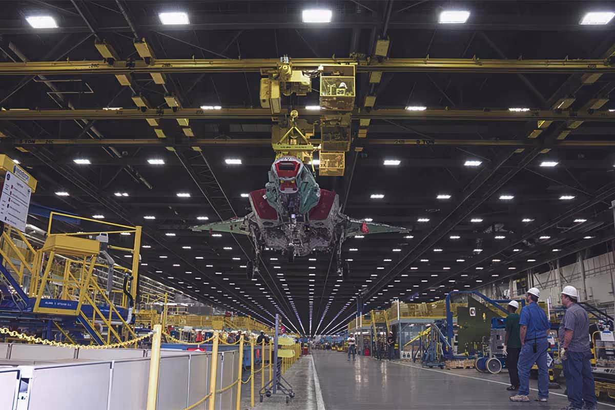 View of an assembly line of a fighter jet facility with polished concrete flooring