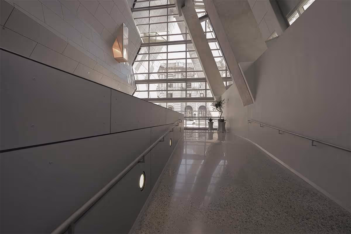 Hallway of an institutional building with polished concrete flooring