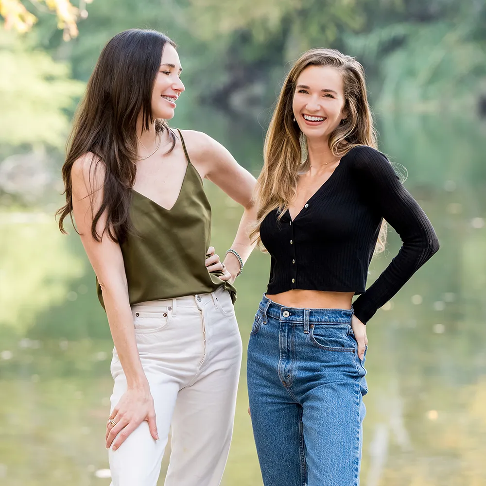 Blaine and Sydney standing together, smiling