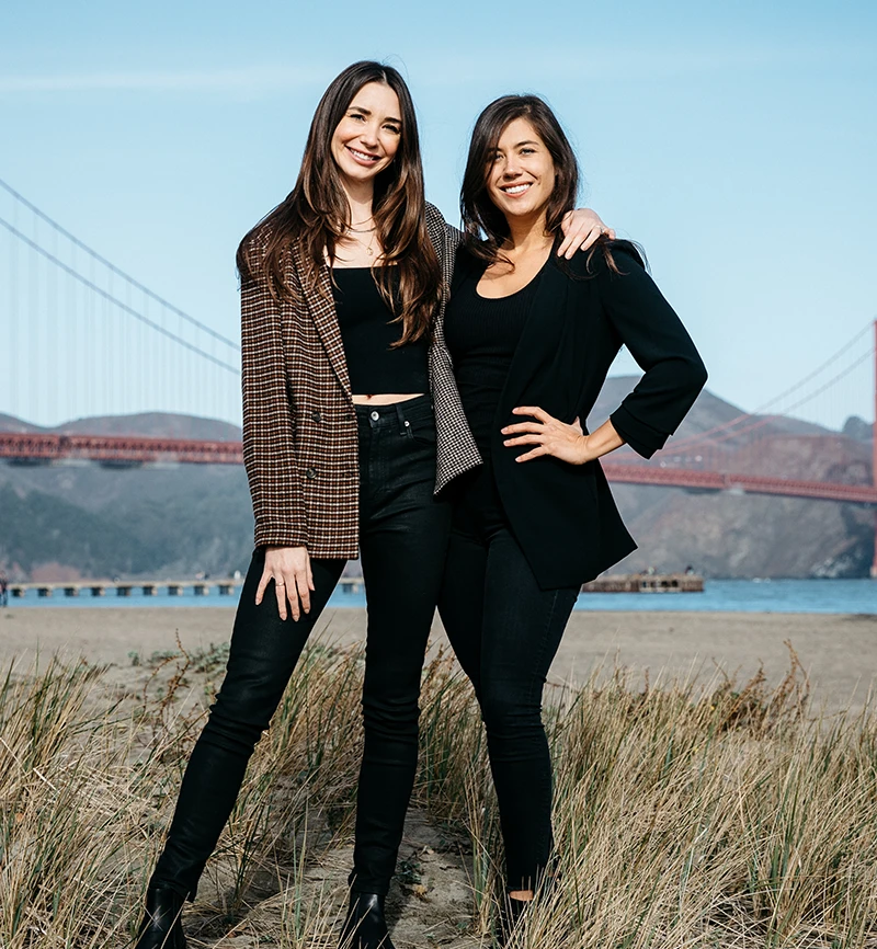 Photo of Blaine and Tara standing in front of the Golden Gate Bridge