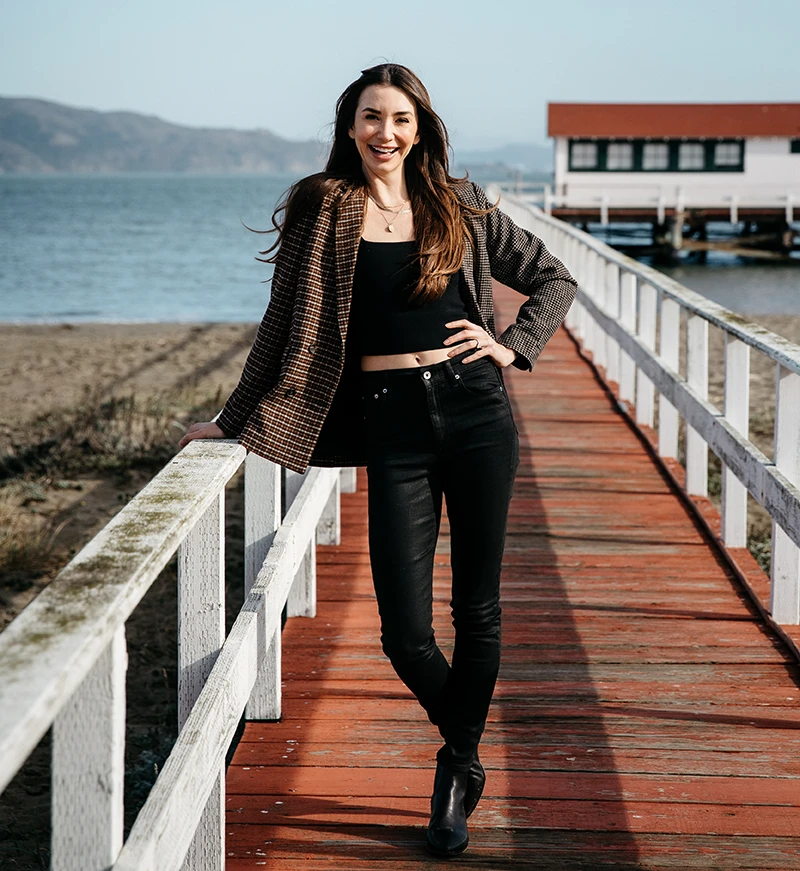 Photo of Blaine standing on a pier near Fisherman's Wharf in San Francisco