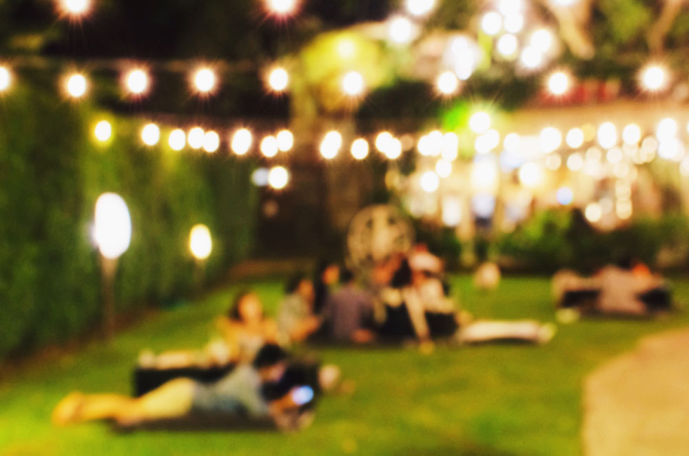Bokeh lighting effect photo of a backyard concert