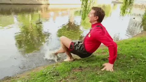 Gif of a man anxiously dipping his toe into water
