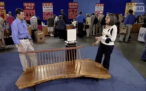Gif of an appraiser waving her hands on the Antiques Roadshow