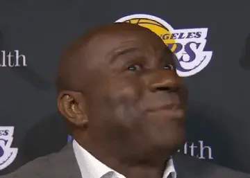 Gif of Magic Johnson waving his head back and forth, indicating no.