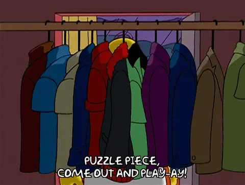 Gif of Homer Simpson opening his closet to look for clothes