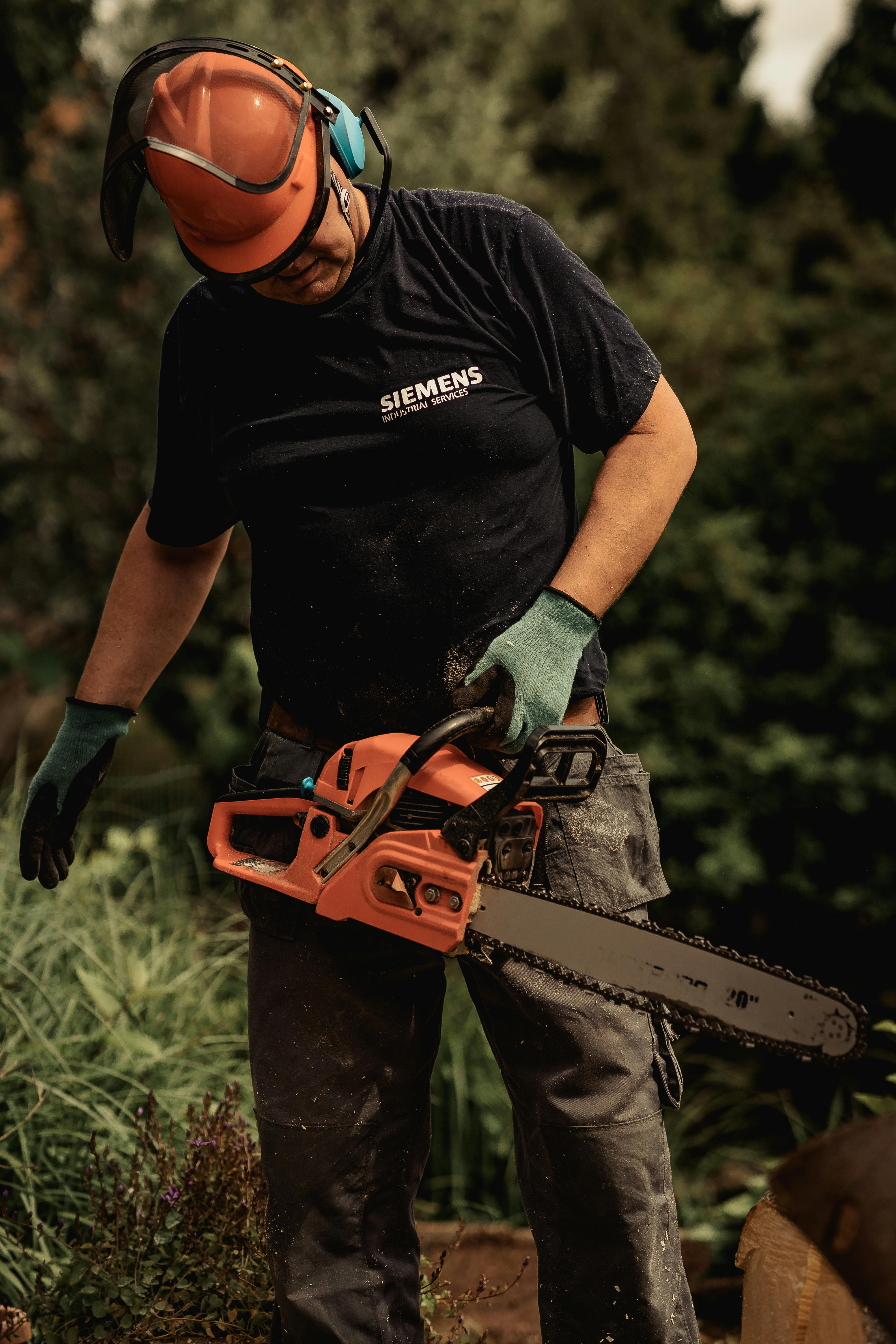 Man holding a chainsaw