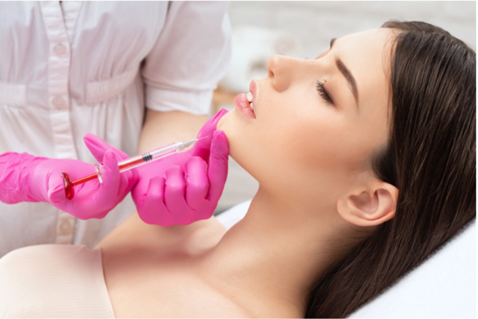 Cosmetic provider administering an injection near the under-eye area, illustrating PRP injections vs. fillers for under-eye rejuvenation and treatment comparison
