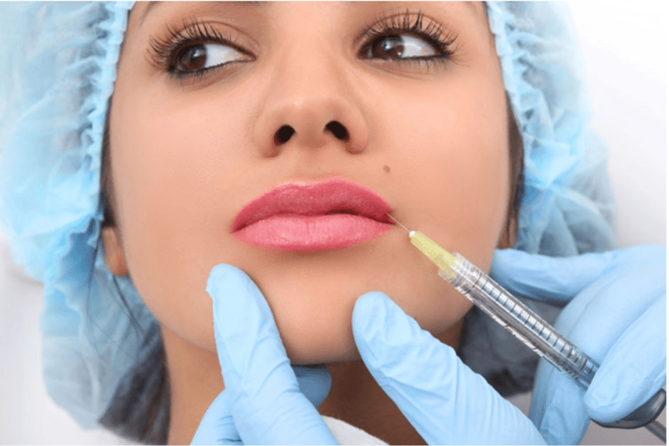 Cosmetic provider administering an injection near the under-eye area, illustrating PRP injections vs. fillers for under-eye rejuvenation and treatment comparison