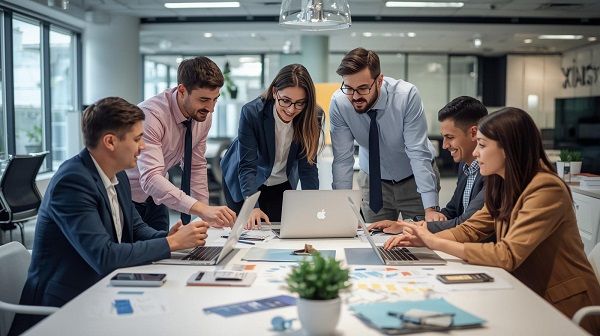 Business team collaborating in a meeting to review global hiring strategies, employer of record costs, and workforce planning.