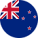 Flag of New Zealand featuring a blue field with the Union Jack in the canton and four red stars with white borders on the fly side.
