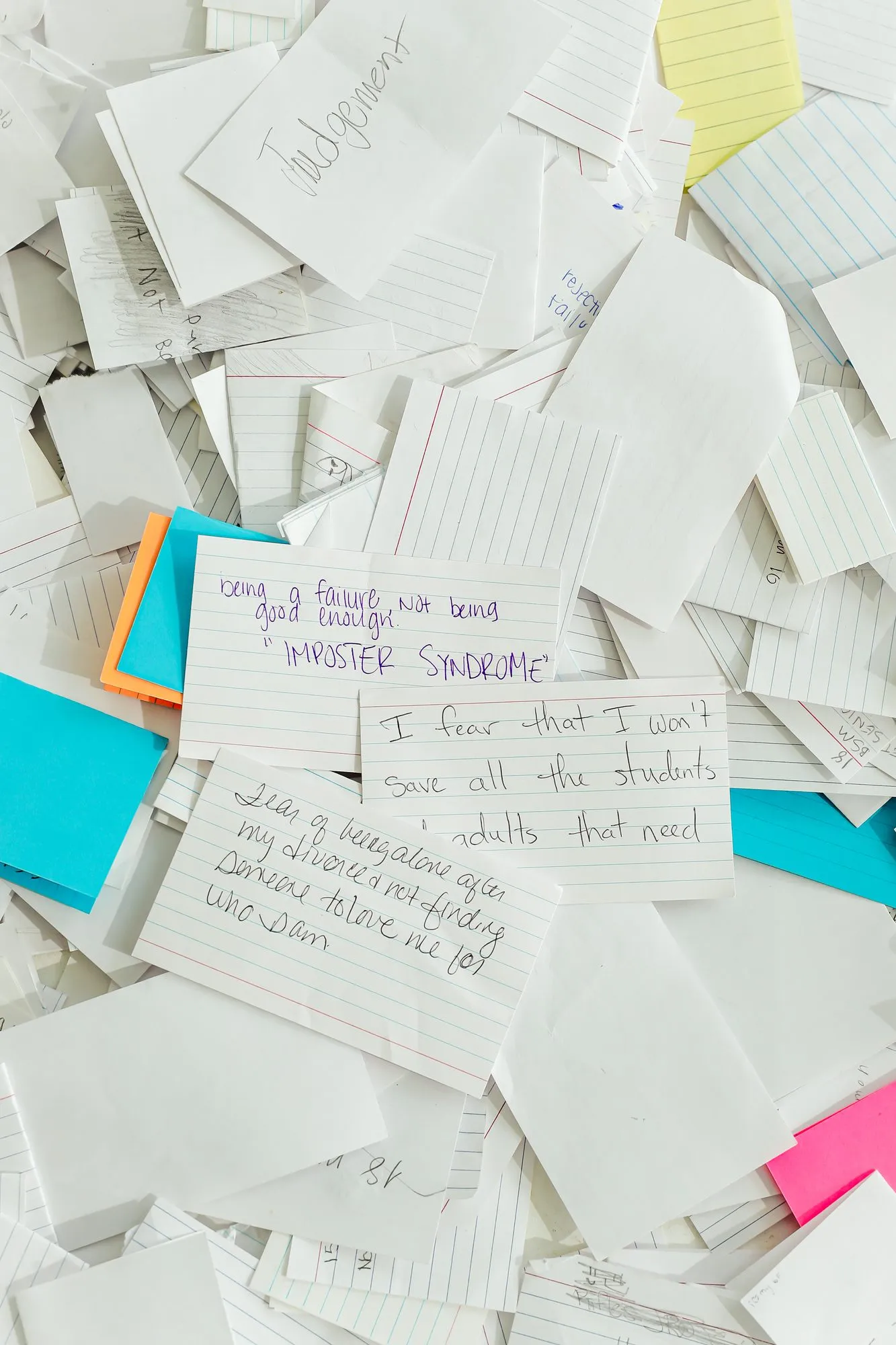 A pile of handwritten fear cards