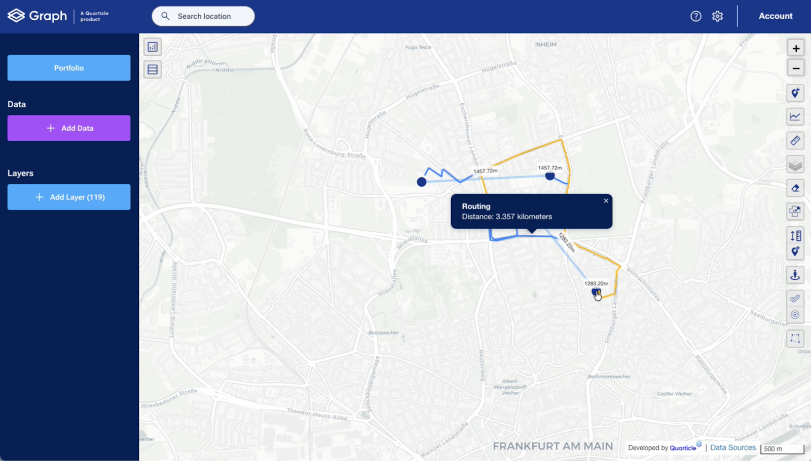 Graph by Quarticle displaying a multi-layer routing visualization on a map of Frankfurt am Main, Germany. A portfolio sidebar includes data layers and options to add data or layers. The map shows a calculated route path in blue segments totaling 3.357 kilometers, with distance labels marked along colored line segments (blue, yellow, orange) connecting different points. A routing info popup highlights the total distance, overlaid on a detailed street map with zoom controls and scale bar (500 m).