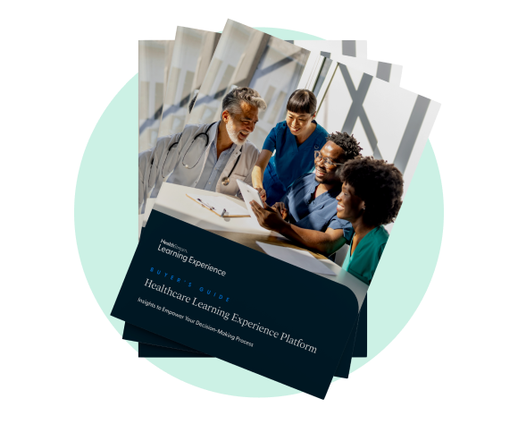 Cover of a buyer's guide titled Healthcare Learning Experience Platform showing four healthcare professionals smiling and discussing a document together.
