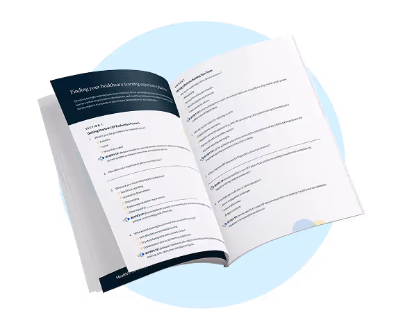 Open book showing healthcare learning module with lesson titles and key questions on white pages.