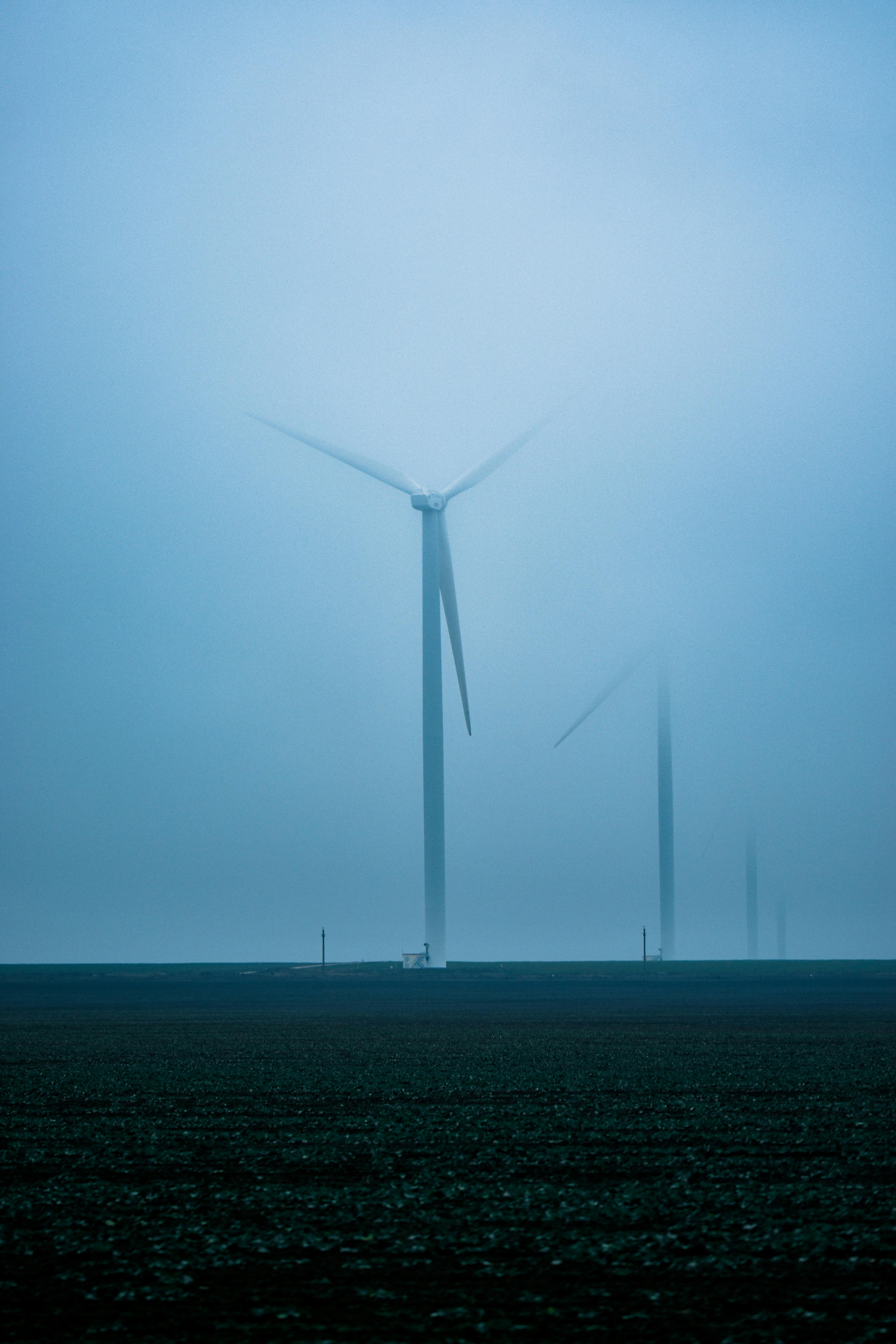 image of a modern eco-friendly building with integrated renewable energy systems